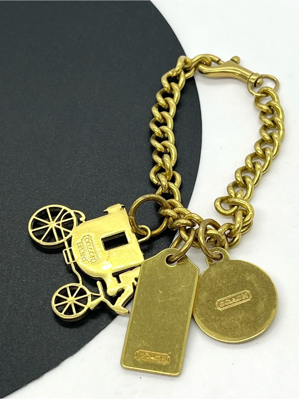 Coach Gold Tone Charm Bracelet with Carriage Charms